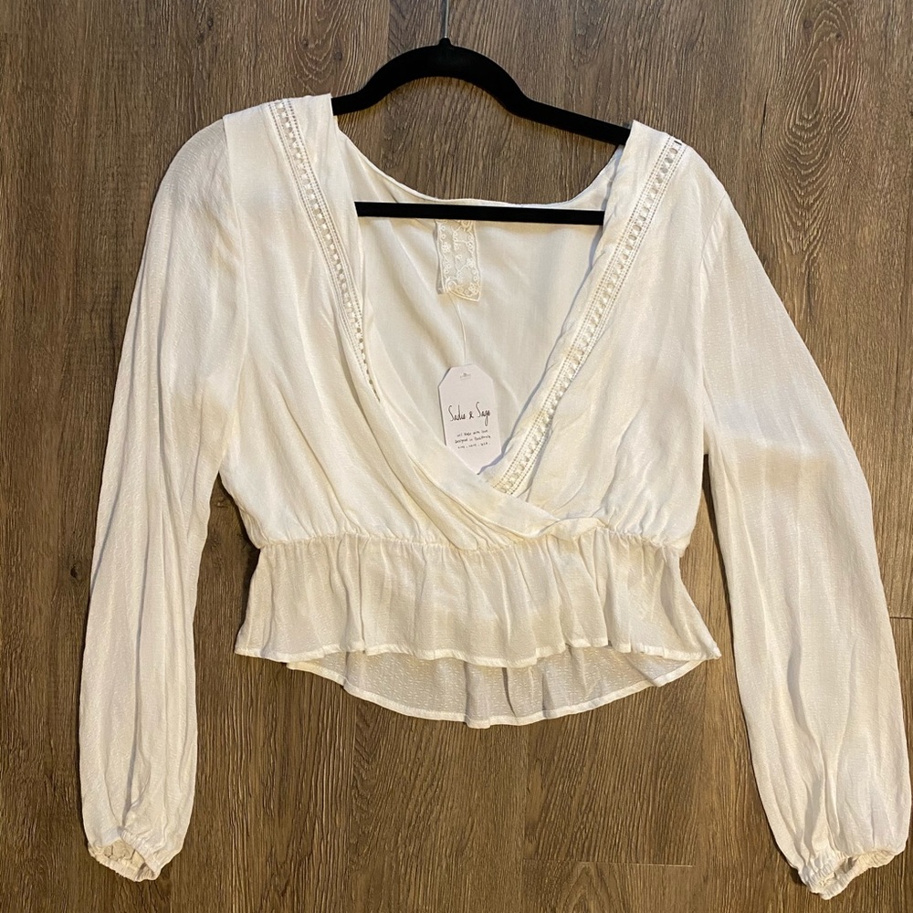 Cute white long sleeve top